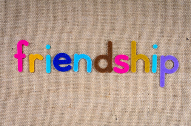 colorful letters spell "friendship"